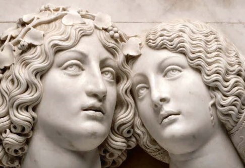 Deux têtes de statues représentant le corps et l'âme