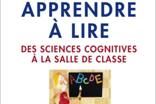 Young girl writing the alphabet on the blackboard