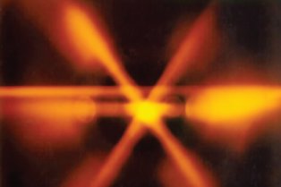 « Mélasse optique » d’atomes de sodium refroidis par la lumière de faisceaux laser (photographie : W. D. Phillips, NIST)