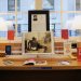 Photos of a table presenting Esther Duflo's selection of publications